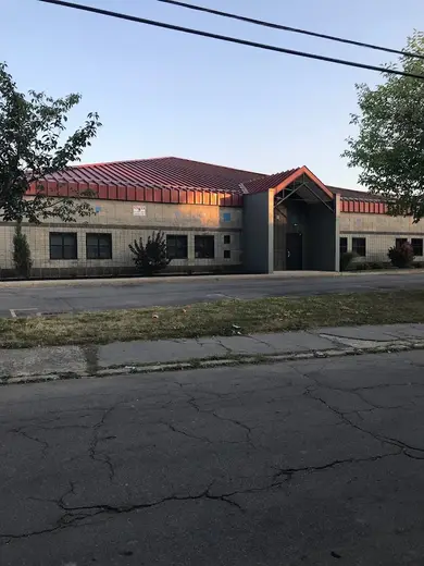 Modern building exterior of Crisis Services detox center in Buffalo.